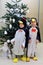 Two boys dressed as penguin standing near