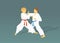 Two boys are engaged in karate