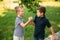 Two boys friends spend time in park. Children models