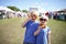 Two boys Having Fun Eating Pretzles at Farmer`s Market