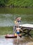 Two Boys Having Fun with Inflatable Rubber Boat