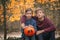Two Boys holding a pumpkin. The concept of holidays. Preparing for Halloween. Harvest