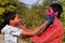 Two boys are playing in colors in happy posture, Concept for Indian festival Holi