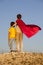 Two boys playing superheroes on the sky background, Superhero pr