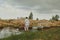 Two boys playing in tranquil waterhole in Australian bush setting