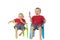 Two boys with popsicles on lawn chairs