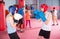 Two boys practice in boxing sparring