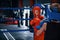 Two boys in protective equipment have sparring and fighting on the boxing ring