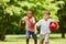 Two boys racing in the park