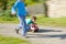 Two Boys Riding Downhill