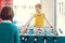 Two boys in school break playing tabletop football