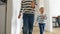 Two boys are seen running down a long wooden corridor in slow motion, their happy faces reflecting the joys of childhood