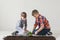 Two boys are thrown plants for Earth Day