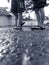 Two boys Walking at asphalt with sandals