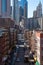 Two Bridges Overhead Street Scene with a view of the Lower Manhattan Skyline in New York City