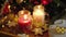 Two bright beautiful burning Christmas candles in glass jars