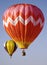 Two Brightly Colored Hot Air Balloons