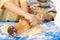 Two brothers cook dough for a pie