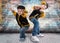 Two brothers dancing break dance.Hip-hop style.The cool kids.