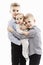 Two brothers are holding a newborn. Love and tenderness in the family. White background.