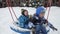 Two brothers laughing and swinging on a snowy playground. Winter playtime, outdoor activity, and sibling relationships.