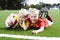 Two brothers lying on football field