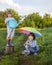 Two brothers play in rain