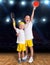 Two brothers play tennis in the sports hall.Champions.