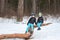 Two brothers in the winter forest