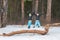 Two brothers in the winter forest