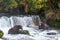 Two brown bears fishing for salmon in the Brooks River in the pools below Brooks Falls, Katmai National Park, Alaska, USA