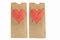 Two Brown paper lunch bags with heart and I love y