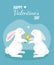 Two bunnies in love. The boy hare gives flowers to the girl. Valentines Day.