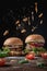 two burgers on a dark background