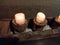 Two burning candle lights in wooden case with amazing background. Candlelight, candlelight for couples, candlelight dinner