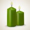 Two burning green vector candle isolated