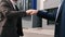 Two business man friendly meeting clapping hands and fist greeting together downtown street closeup