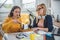 Two business woman working together at the office