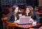 Two business women in cafe