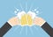 Two businessman hands toasting glasses of beer