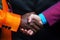 Two businessmen in colorful suits shaking hands.