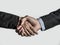 Two businessmen hands handshake isolated on white background