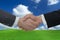 Two businessmen handshake - business concept