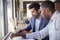 Two Businessmen Having Informal Meeting In Coffee Shop