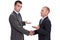 Two businessmen rejecting the responsibility and absolving themselves of guilt with a handshake, isolated on white