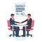 Two businessmen sitting at table shake hands after signing contract