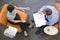 Two businesspeople sitting indoors having meeting