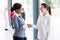 Two businesswomen handshaking