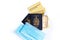 Two Canadian passports with yellow immunity vaccination records, face sanitary blue masks and sanitiser. Safety measures against