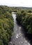 Two canoeists on the river below the pontcysyllte canal in wales